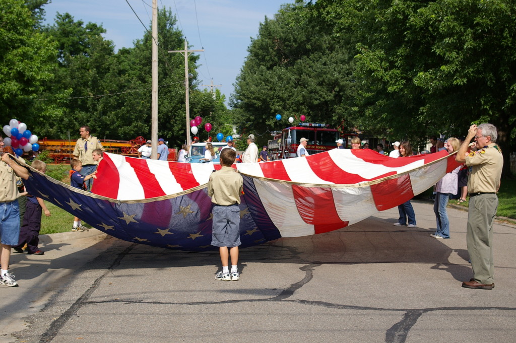 Boy Scouts holding the US Flag